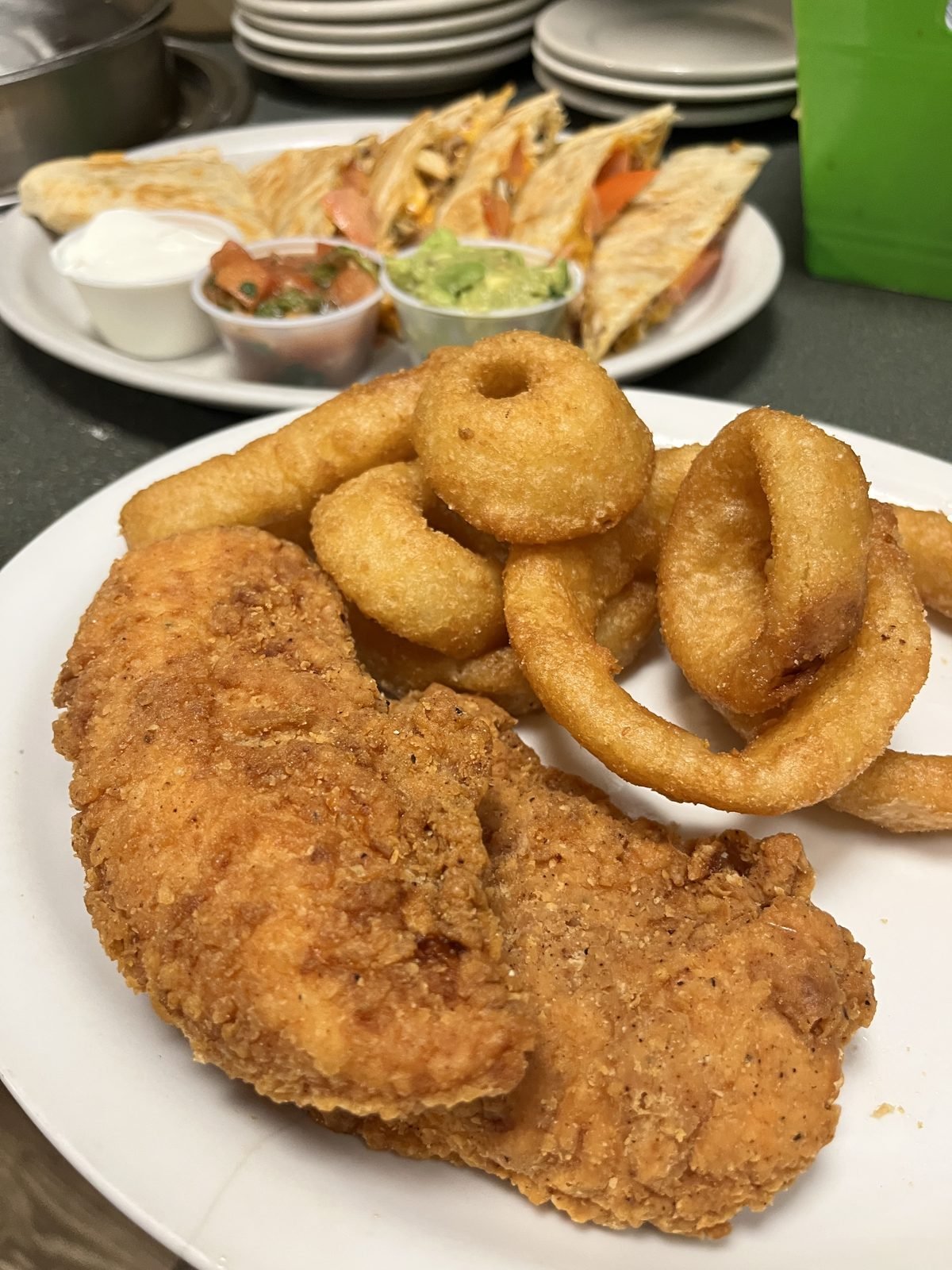 Chicken fried steak with onion rings