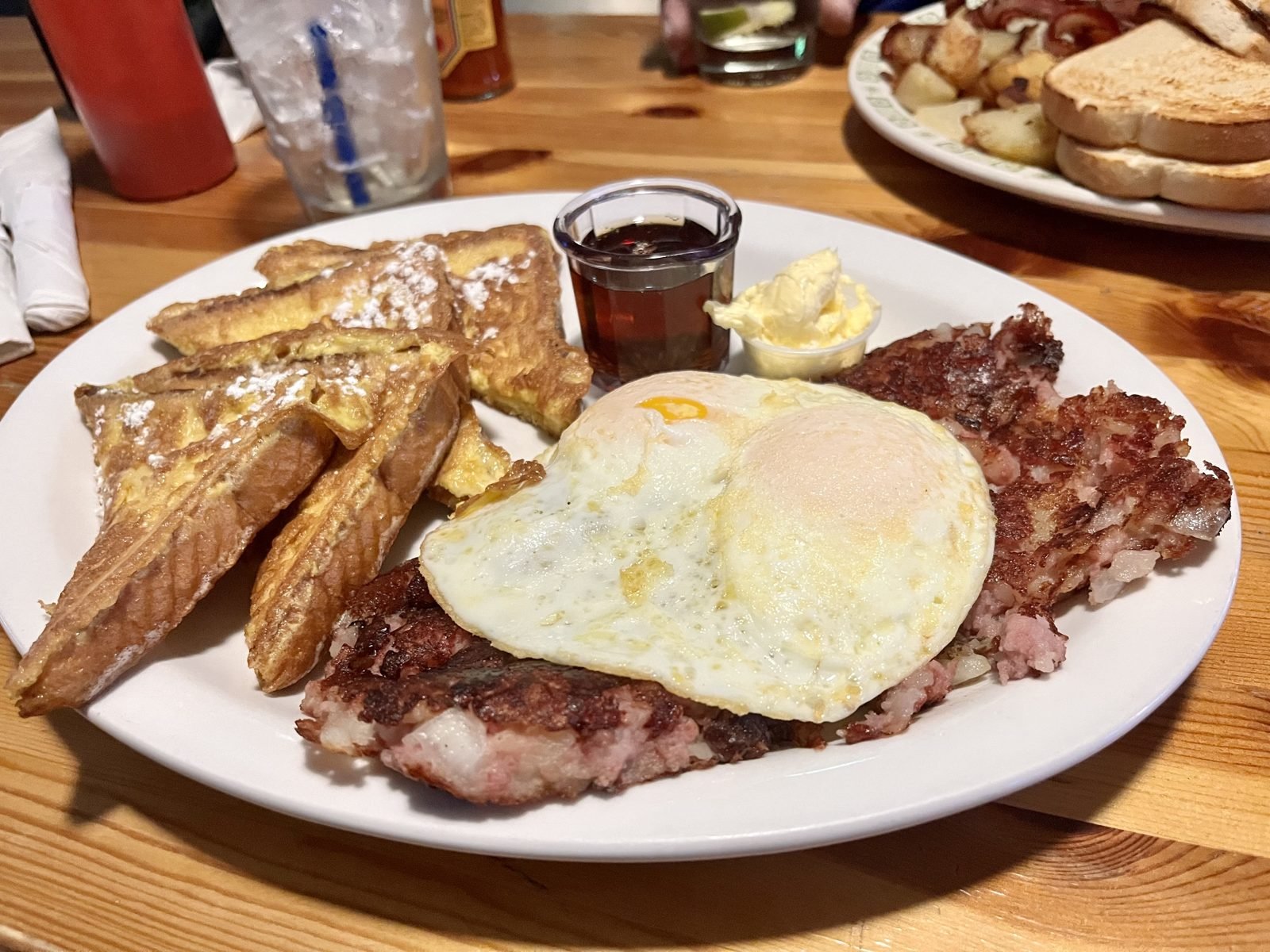 French toast with an egg and corned beef hash